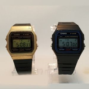 A Pair Of Casio F-91W Watches